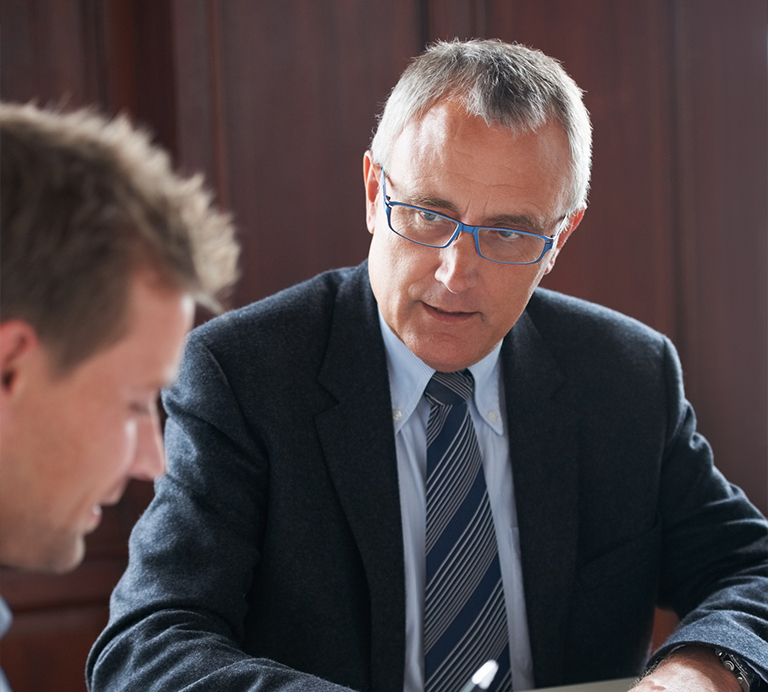 a man wearing a suit and tie