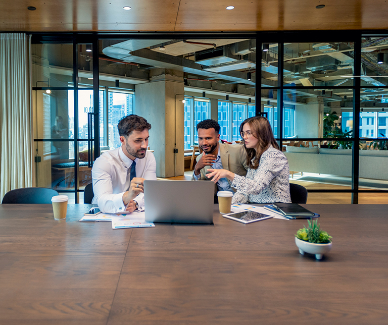 a group of people sitting at a table